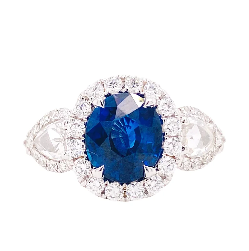 Three Stone Sapphire and Diamond Halo Ring