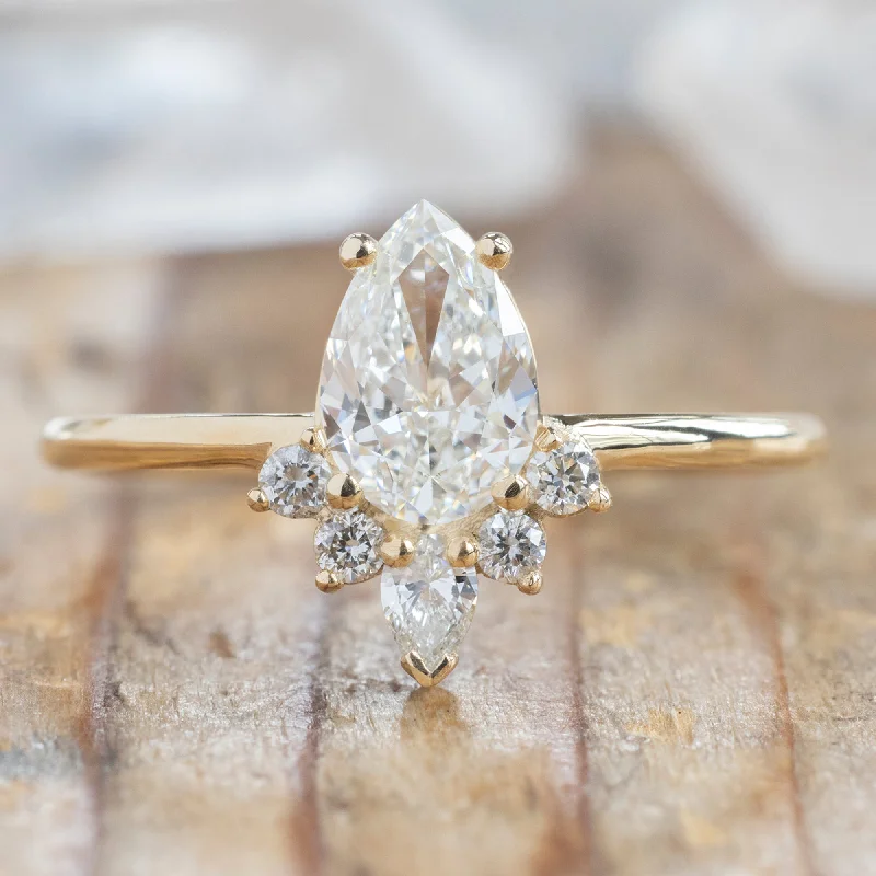 The Aster Ring | 0.73ct Pear Cut White Diamond in 14K Yellow Gold